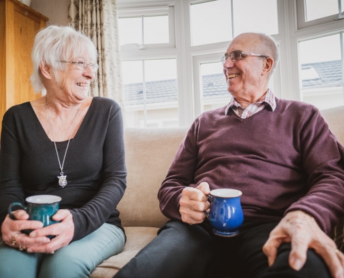 55 year old couple enjoying new lifestyle after best age to downsize to a park home