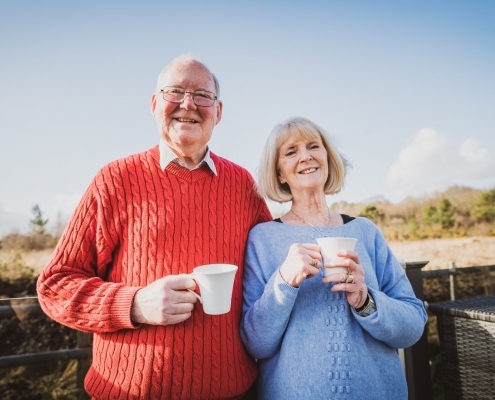 55 year old couple enjoying new lifestyle after park home downsize move