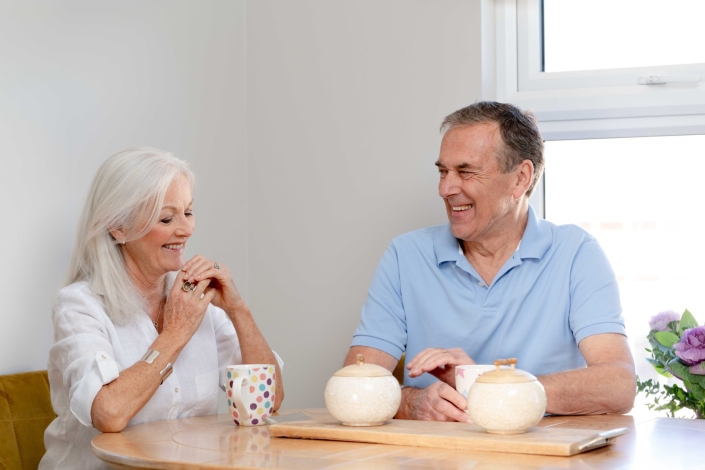 couple chatting inside park home