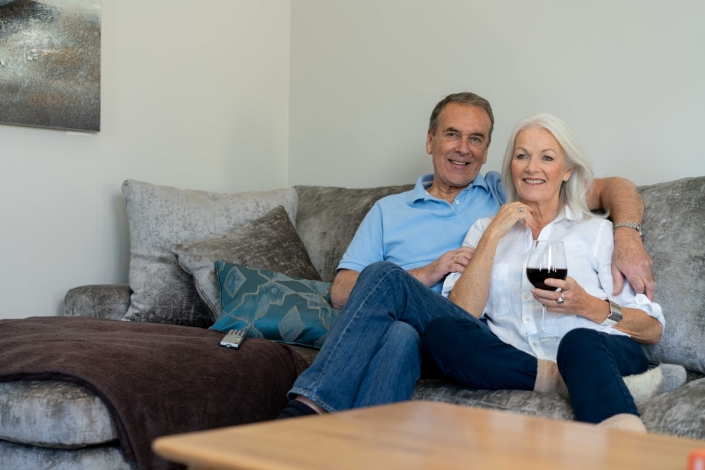 couple walking sitting inside park home