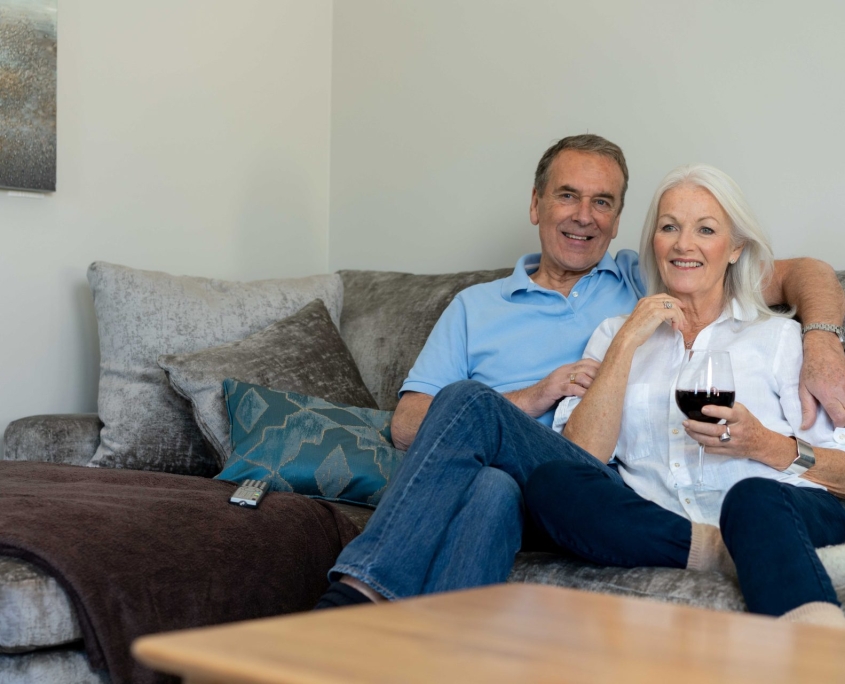 couple walking sitting inside park home