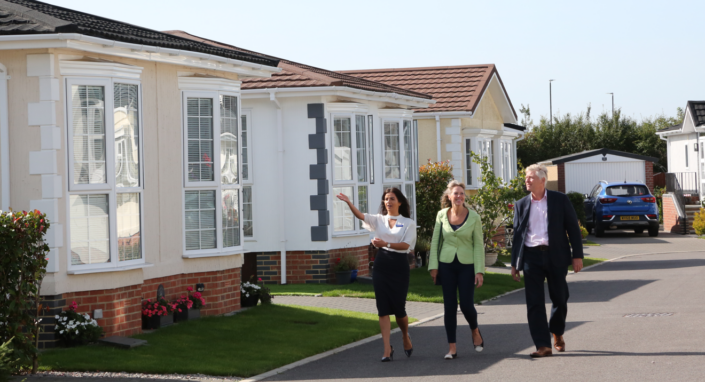 Quickmove sales consultant giving tour of a park home development