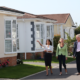 Quickmove sales consultant giving tour of a park home development